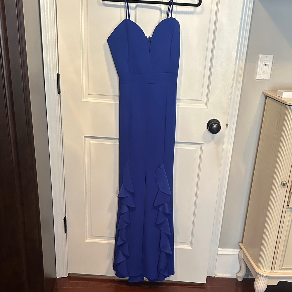 NWOT Royal Blue Sweet Storm padded dress. Slit in front ruffles